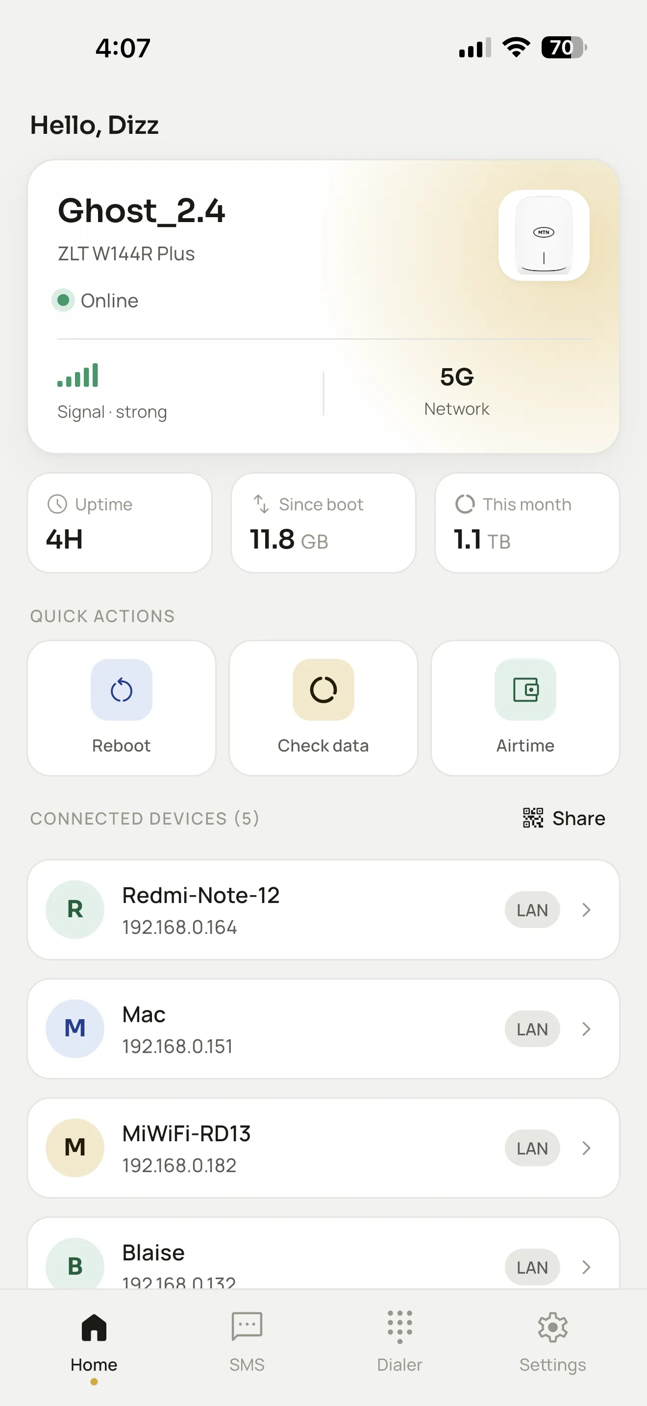 Mi MDev home screen showing device status, signal strength, and monthly data usage